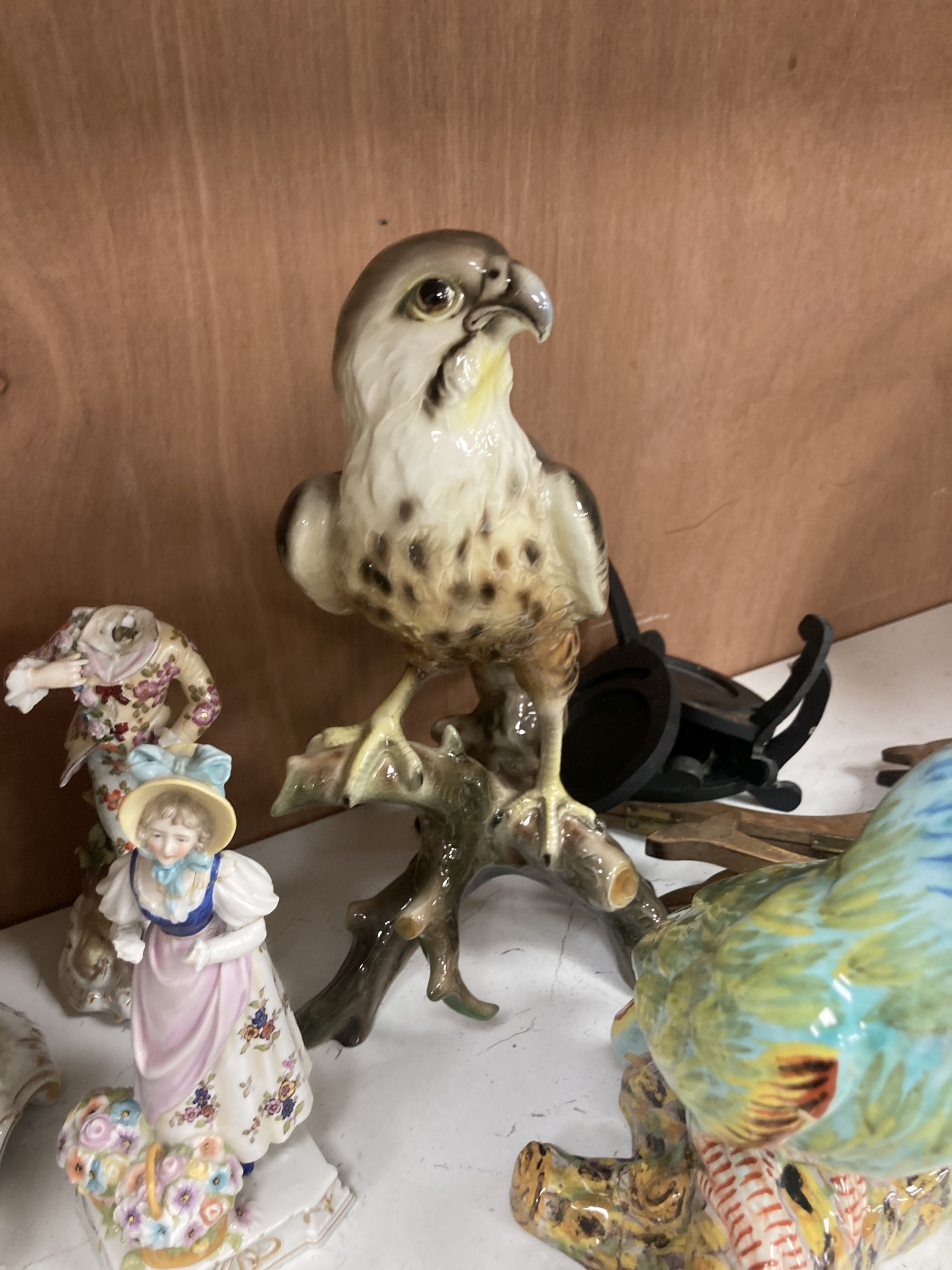 A collection of figurines, cabinet cups plates, two boxes, etc.